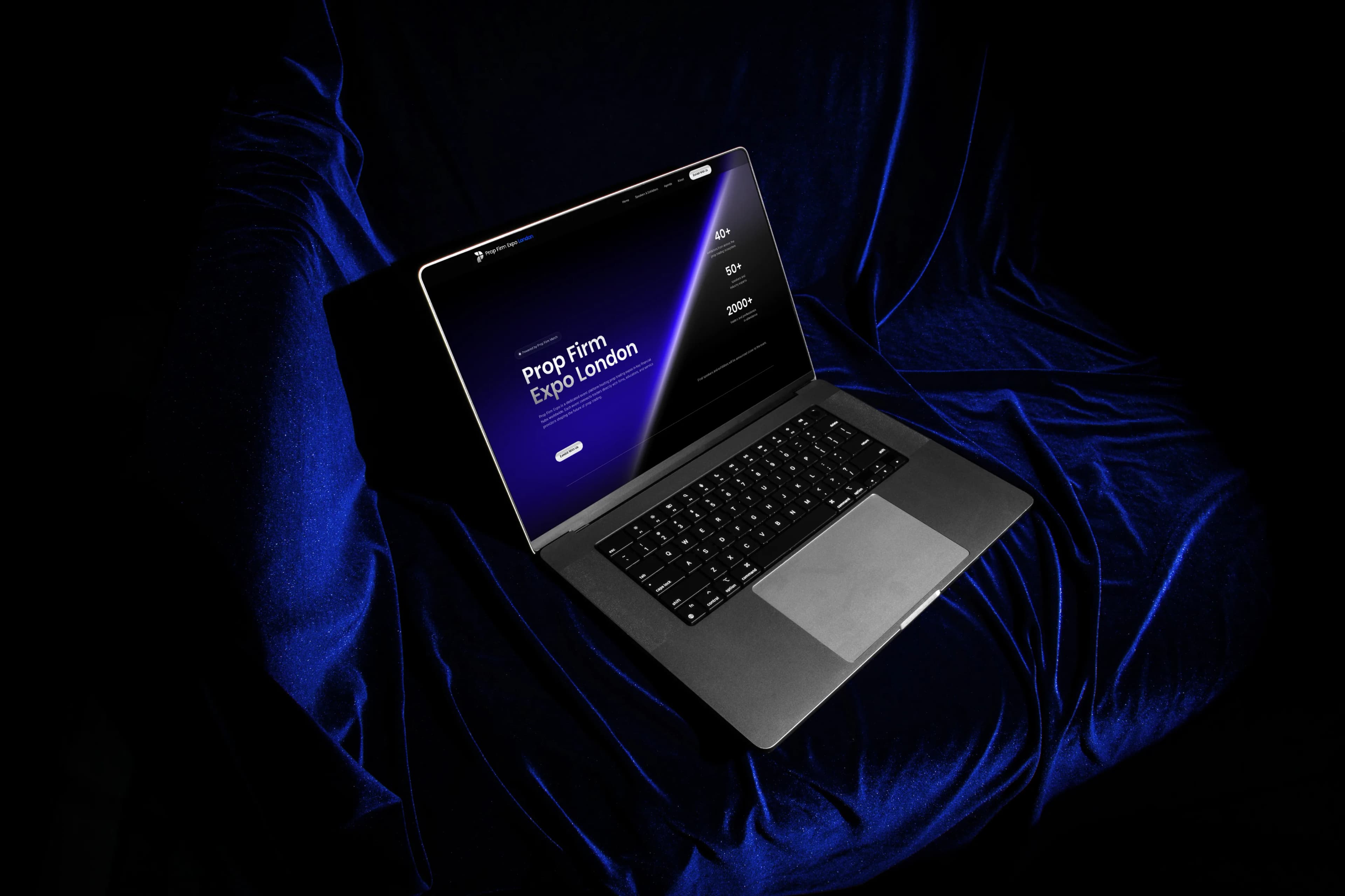 Prop Firm Expo website on MacBook
